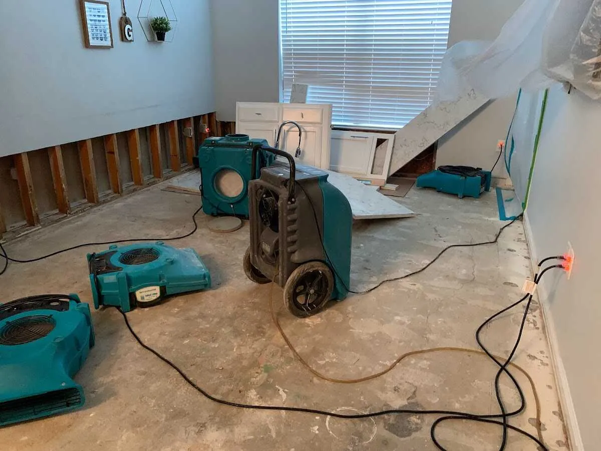 Dehumidifier in flood-cut room for Water Damage Restoration in London Grove